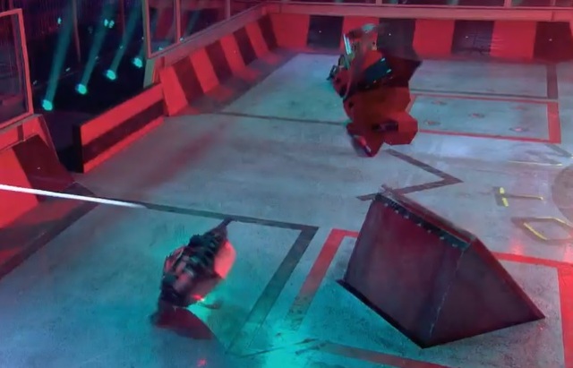 Thor (R.) and M.R. Speed Squared are both flipped by the arena floor flipper.